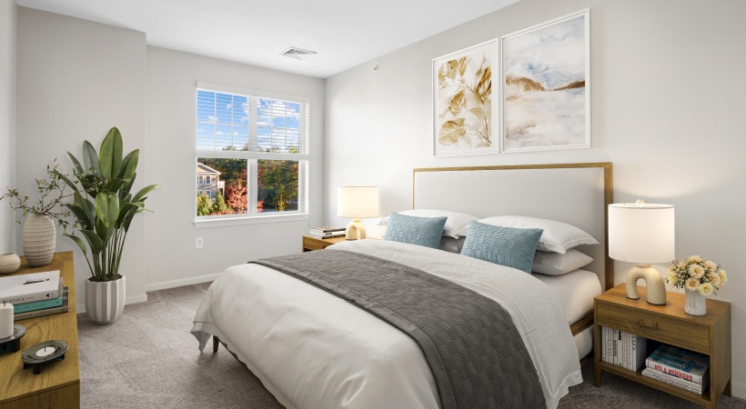 1-, 2-, and 3-Bedroom Apartment Floor Plans Available 2 bedroom apartment for rent at The Prescott at Concord featuring carpet flooring, windows with views of nature, and staged with modern furnishings.