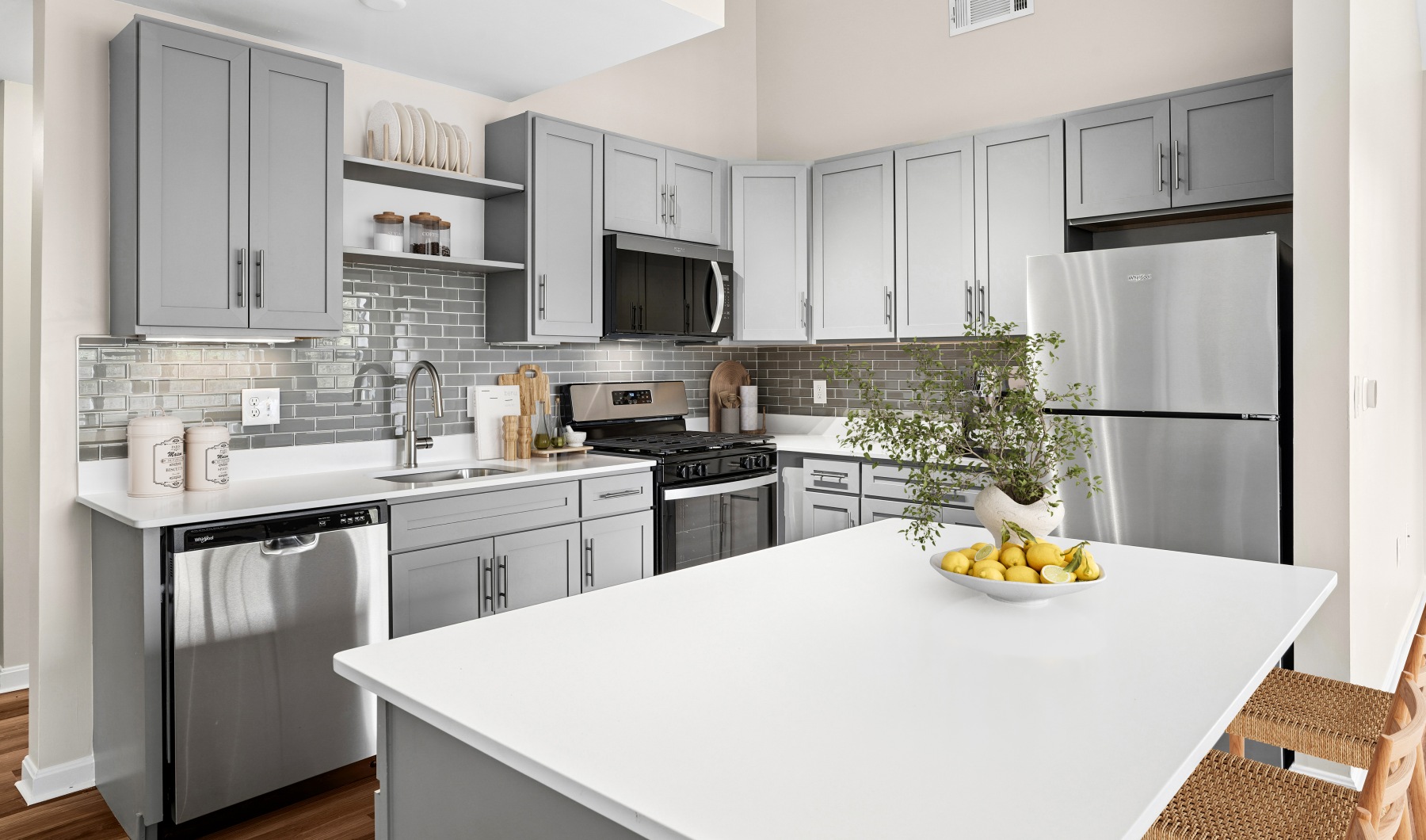 Open kitchen and living room with plenty of natural light.